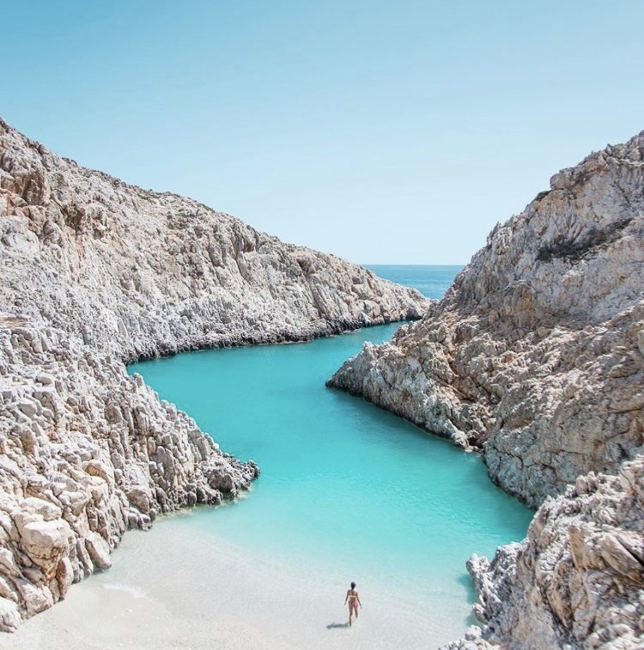 Seitan Limania beach with turquoise waters and dramatic cliffs near Chania, Crete, Greece.